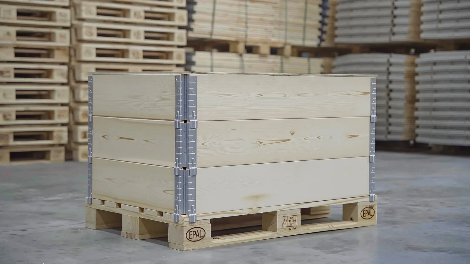 Stacked wooden pallet collars on an EPAL pallet