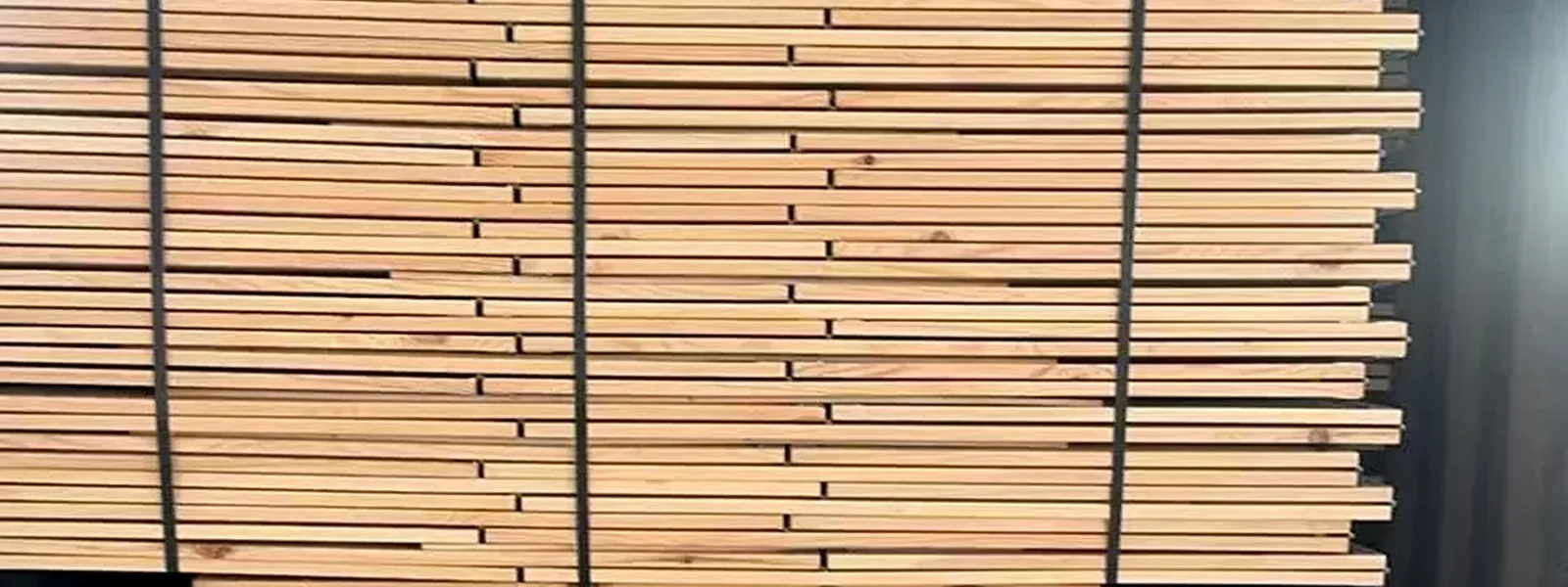 Pallet collar bundles aligned inside a shipping container