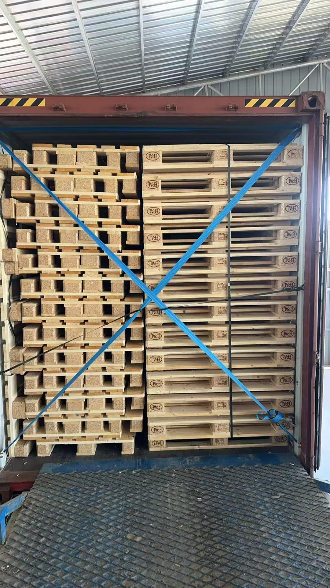 Stacks of EPAL wooden pallets prepared for shipment
